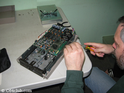 Tom working on his 1541 disk drive - Commodore Computer Club
